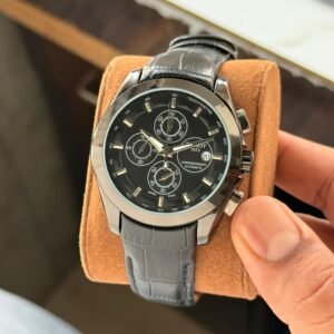 Tissot Couturier 1853 Chronograph automatic watch with a black dial and black leather strap